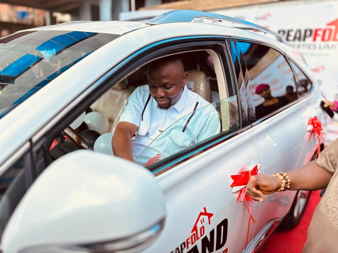 reapfold-properties-limited-rewards-realtor-dr-onunkwor-with-luxury-suv.jpg