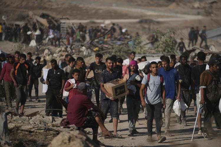 israeli-airstrikes-kill-14-palestinians-in-gaza-another-10-people-die-seeking-food.jpg