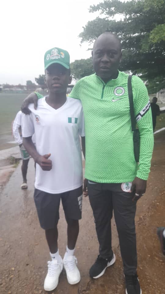 buruj-sports-academy-youngster-raheem-salaudeen-meets-coach-manu-garba-during-visit-to-u17-camp.jpg