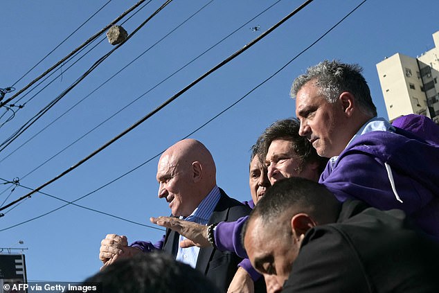chaos-on-the-campaign-trail-argentine-president-javier-milei-pelted-with-stones-amid-corruption-scandal.jpg