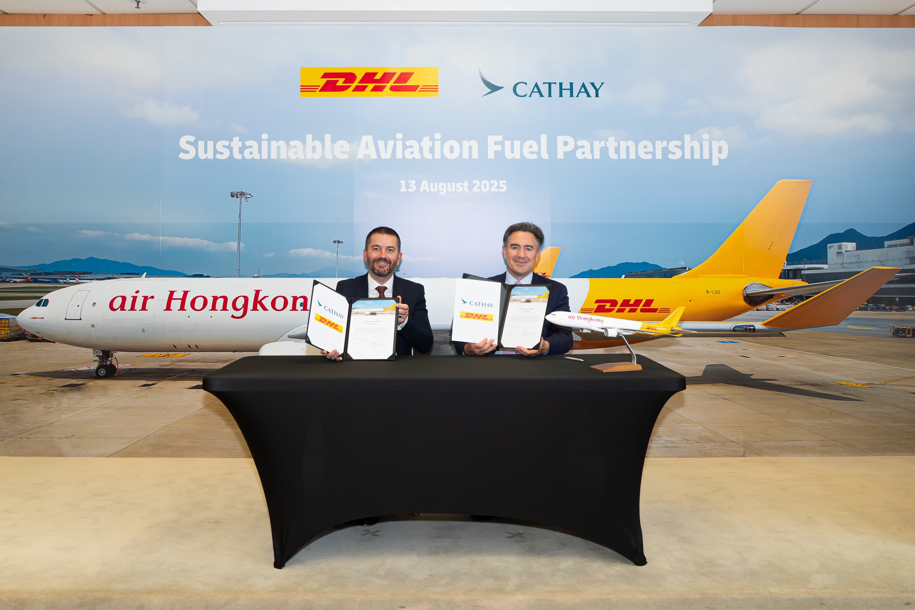 dhl-express-and-cathay-group-sign-new-sustainable-aviation-fuel-saf-deal-to-drive-production-and-uptake-in-asia-l-to-r-peter-bardens-senior-vice-president-for-network-operations-and-aviation.jpg