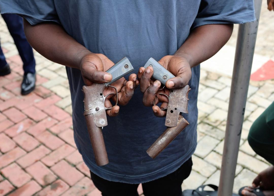 efcc-arrests-suspected-internet-fraudster-with-two-local-pistols.jpg