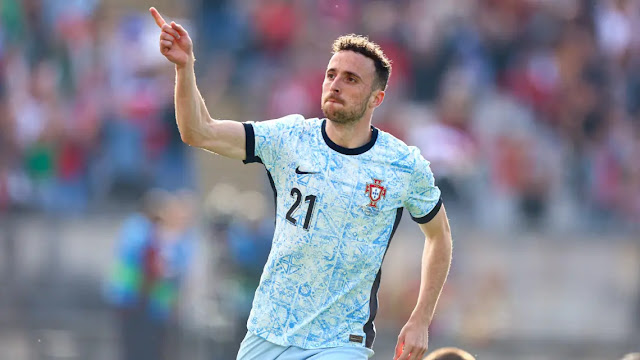 portugal-pays-heartfelt-tribute-to-diogo-jota-by-passing-his-number-21-jersey-to-ruben-neves.jpg