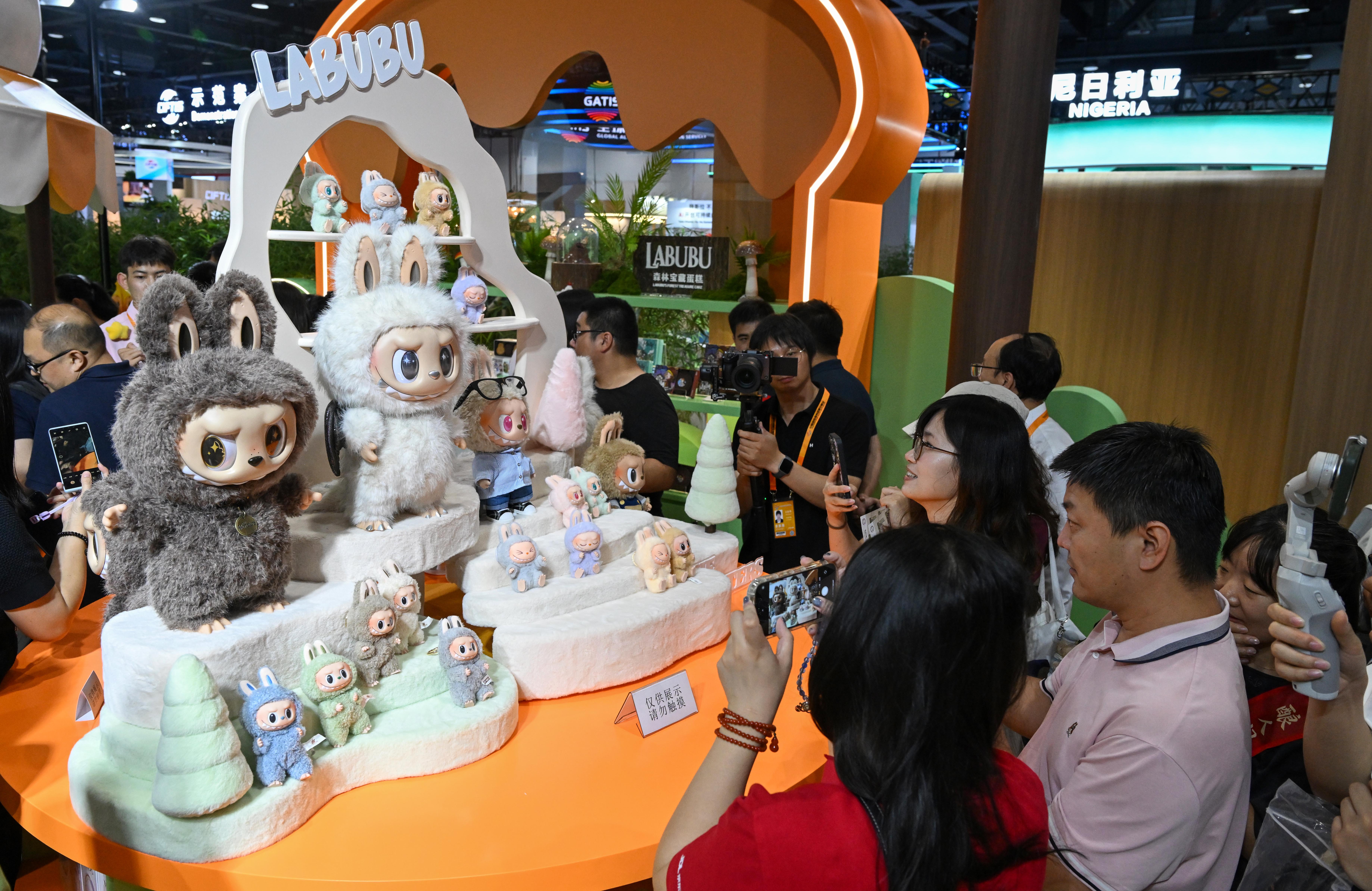 chinese-services-trade-fair-draws-global-participation-highlights-open-markets-people-visit-a-booth-of-pop-mart-during-the-2025-china-international-fair-for-trade-in-services-ciftis-in-beijing-cap.jpg